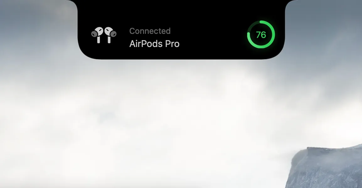 The notch showing an AirPods Pro connected notification and a green battery indicator at 76 percent.